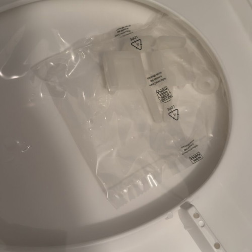 Toilet seat new, white oval shape