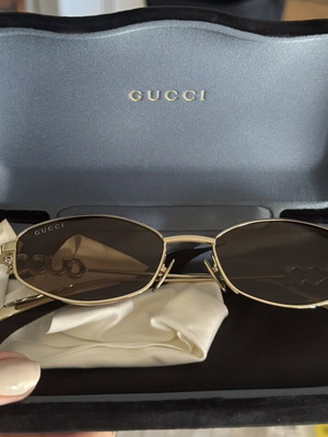Gucci women's sunglasses GG1802S 005 with gold metal frame and brown lenses new