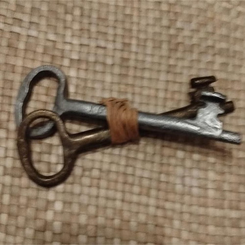 Decorative keys used, two large antique, bronze and silver