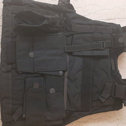Military battle vest black, like new, with ceramic plate holder