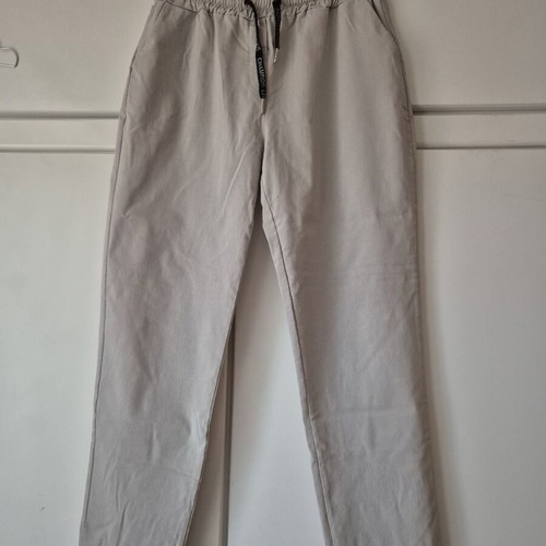 Beige elastic pants size L like new with side pockets and drawstring waist