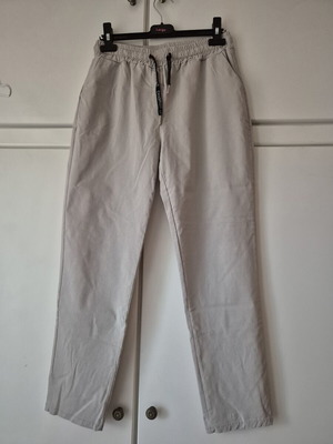 Beige elastic pants size L like new with side pockets and drawstring waist