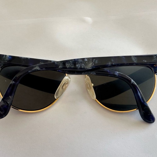 Vintage Kurzenberger sunglasses with blue marbled frame and golden details