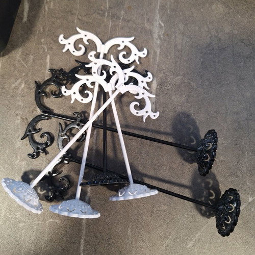 Earring stands, black and white