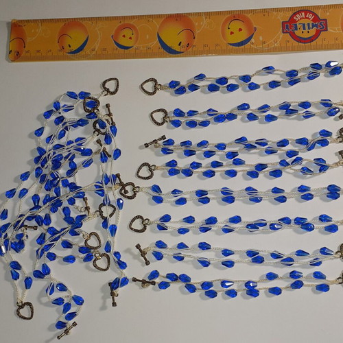 Handmade bracelets pack of 16 with glass beads, white and light ecru thread