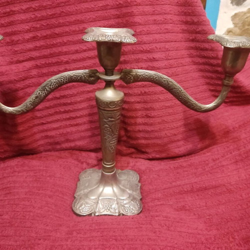 Metal triple candlestick used, ornate and heavy