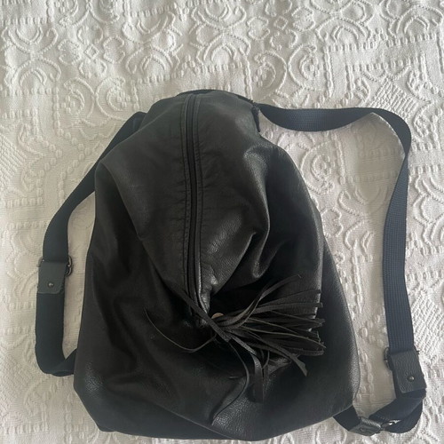 Leather backpack used with inner lining and fabric straps