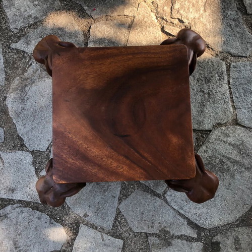 Handcrafted carved wood table with elephants and matching stool, Asian style