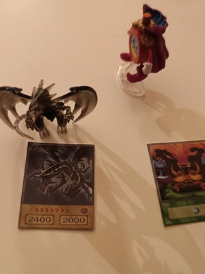 Червени очи черен дракон и Времеви магьосник YU GI OH