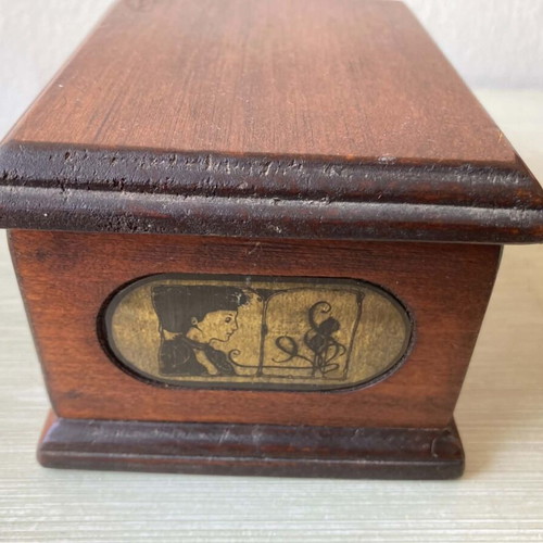 Wooden jewelry box with brass details used