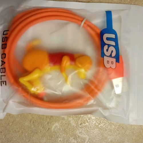 iPhone charger new with moving dog figure