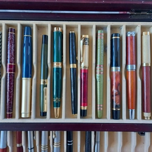 Collectible pens set of 36 with wooden case like new