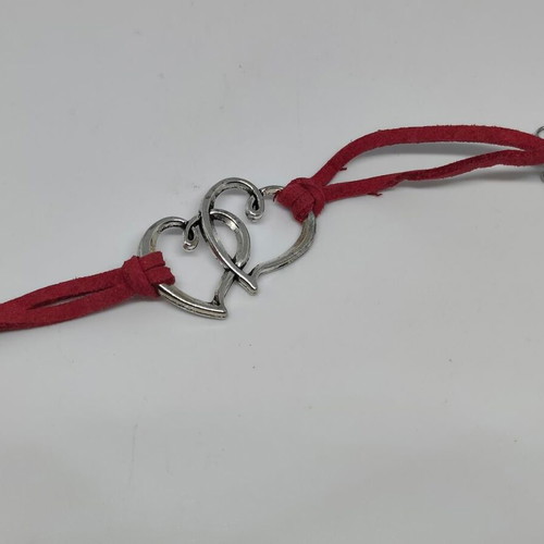 Bracelet with double heart and red suede cord like new