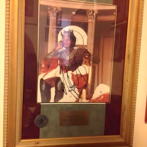 Michael Jackson autograph used in framed glass display