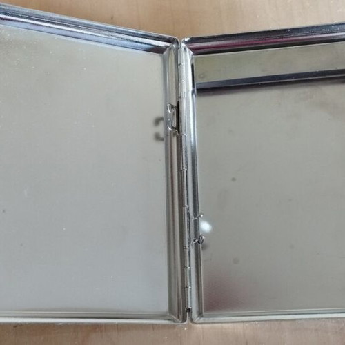 Metal cigarette case used with lighter holder