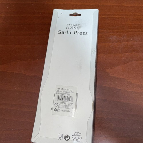 Metal Garlic Press in Packaging
