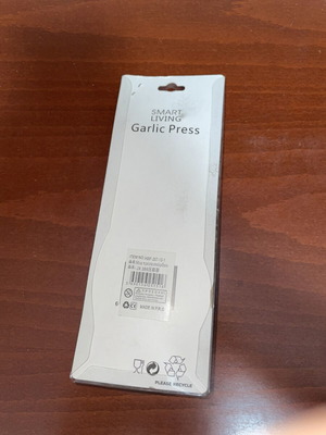 Metal Garlic Press in Packaging