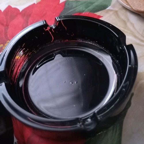 Glass ashtray vintage black classic with four cigarette slots used