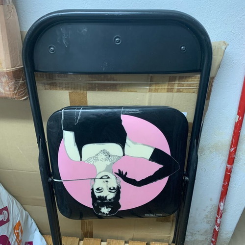 Chair with design used with minor wear
