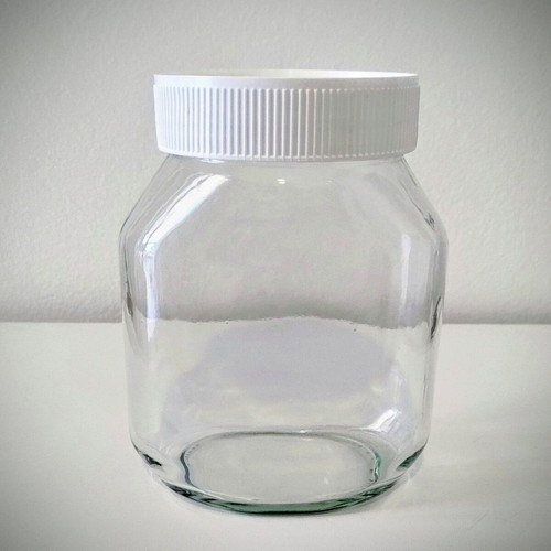 Set of 4 Glass Storage Jars with Plastic Lids like new
