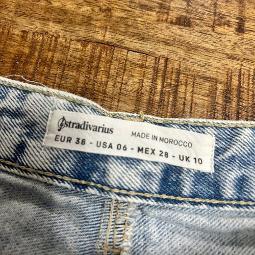 Stradivarius distressed light blue denim mini skirt, size 38