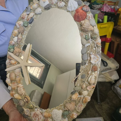Oval mirror decorated with shells like new, handmade
