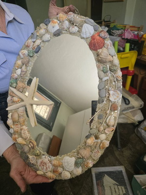 Oval mirror decorated with shells like new, handmade