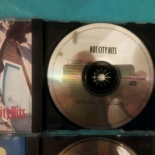 Escape Hot City Hits and Snow Motion Music CDs like new