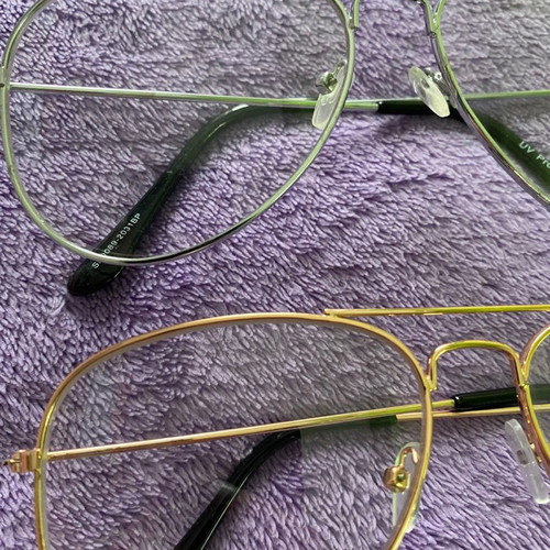 Glasses with clear lenses new, silver and gold frame