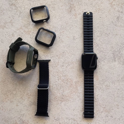 Apple Watch Series 5 44mm with charging cable, straps and screen protectors