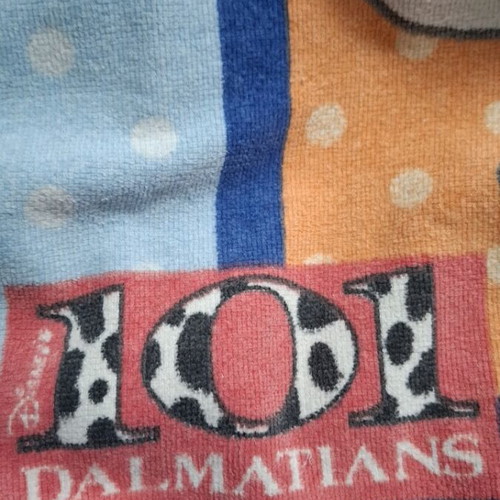 Disney beach towels used, 2 with 101 Dalmatians design
