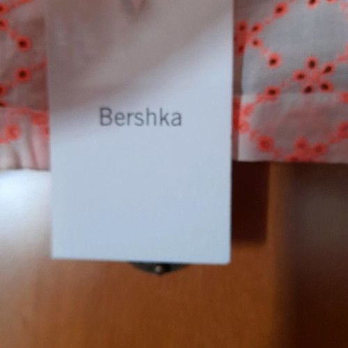 Bershka top new white with orange floral designs size M
