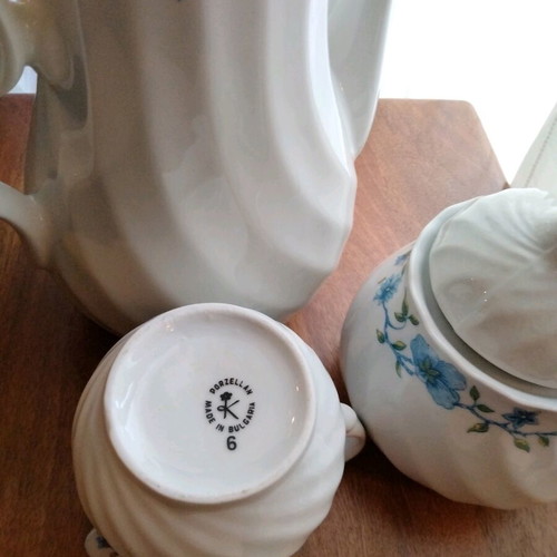 Vintage tea and coffee set in white porcelain like new