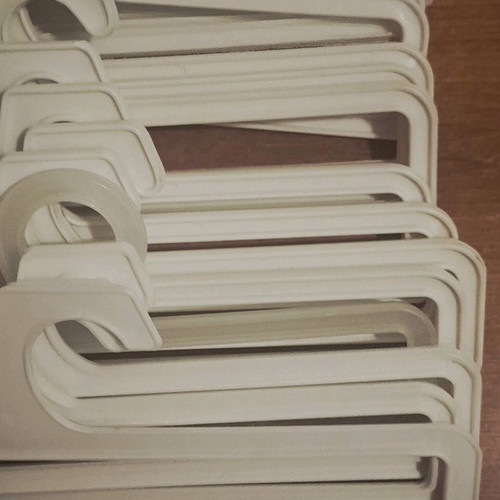 Small white hangers like new, pack of 15 pieces