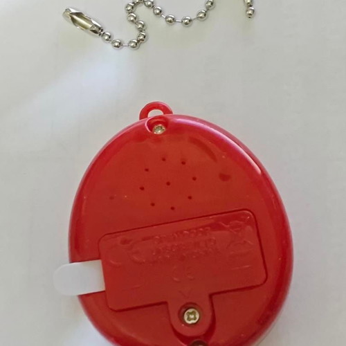 Retro digital virtual pet with chain, like new