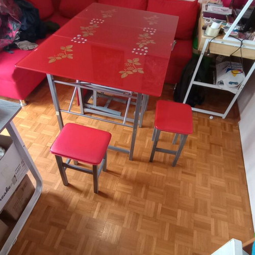 Folding table with 4 stools used, red color