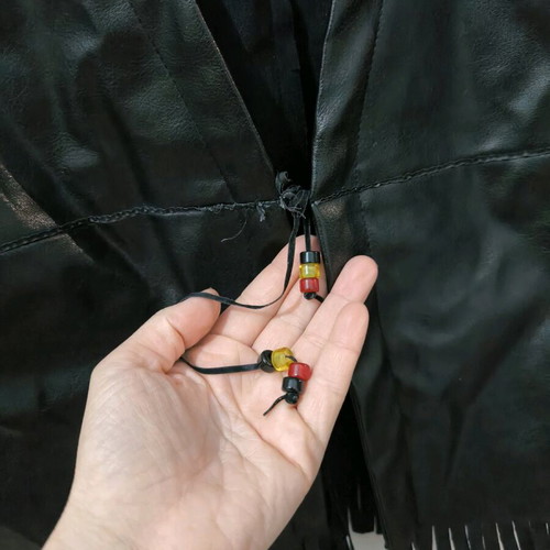 Black faux leather sleeveless vest with fringes like new