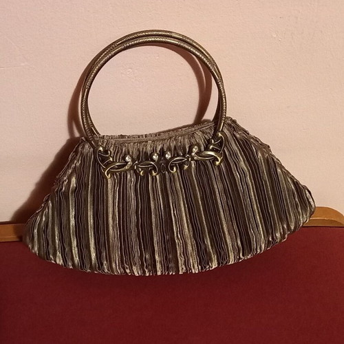 Handbag olive satin with metal details like new