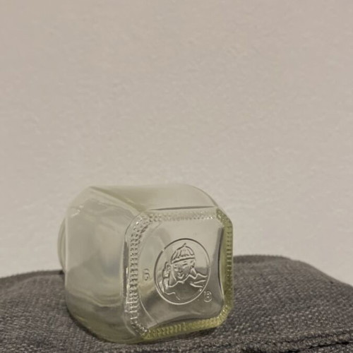Vintage glass jar with embossed lid like new