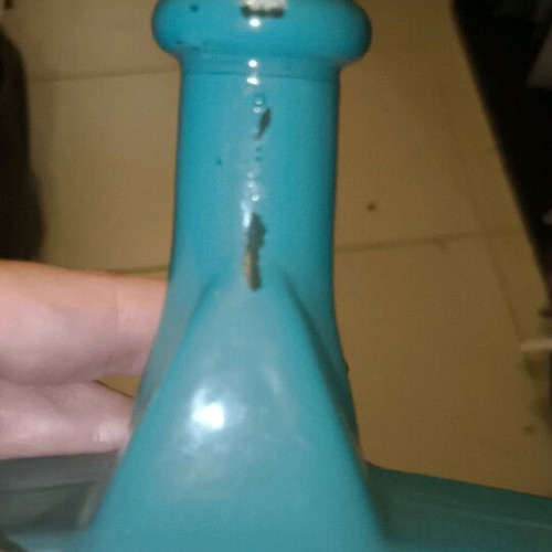Star-shaped bottle with cork like new