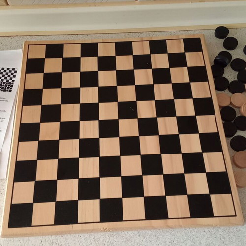 Wooden checkers used, complete set