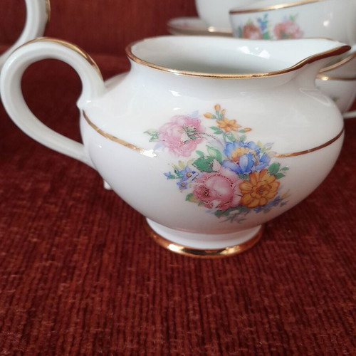 Limoges tea set like new, vintage, missing one saucer