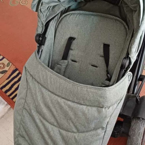 Twin stroller like new with footmuffs and carrycots