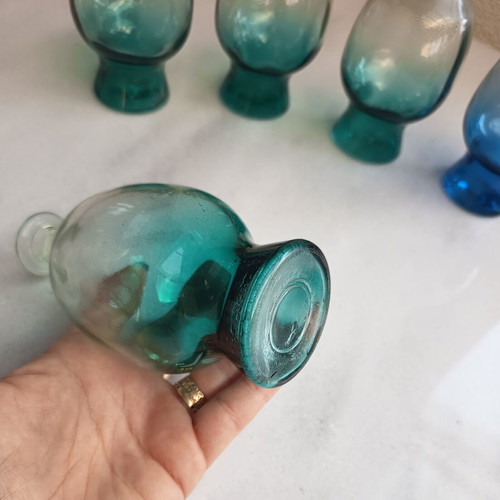 Glass bottles set of 5, 4 green and 1 blue, no corks