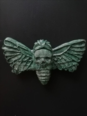 Handmade magnet made of white cement, acrylics and varnish