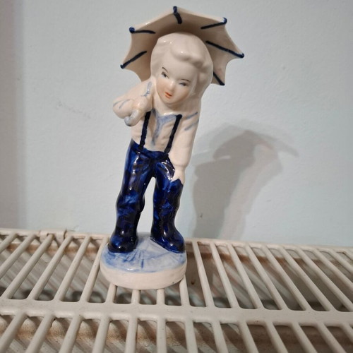 Handmade ceramic figurine girl with umbrella blue Delft like new