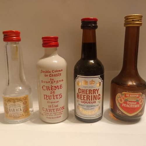 Miniature liqueur bottles, pack of 7, assorted origins