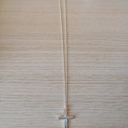 Steel cross like new, silver color