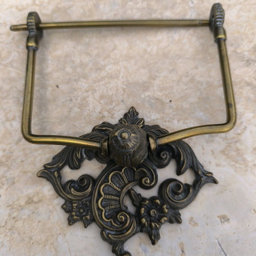 Bronze toilet paper holder used