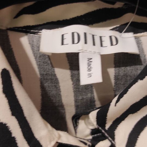 Edited mini dress like new, black and white with cutouts
